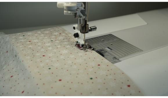 Adjustable 1/4" Piecing Foot With Guide