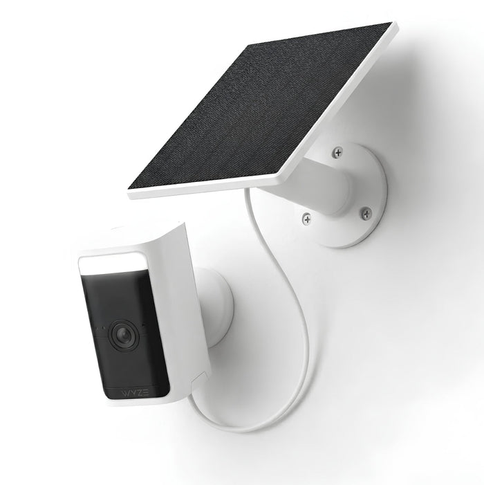 Wyze Battery Cam Pro is a white camera with a black lens on a wall.
