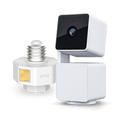 Wyze Lamp Socket v2 Bundle: A white lamp socket with a gold cap and a Pan v3 camera.