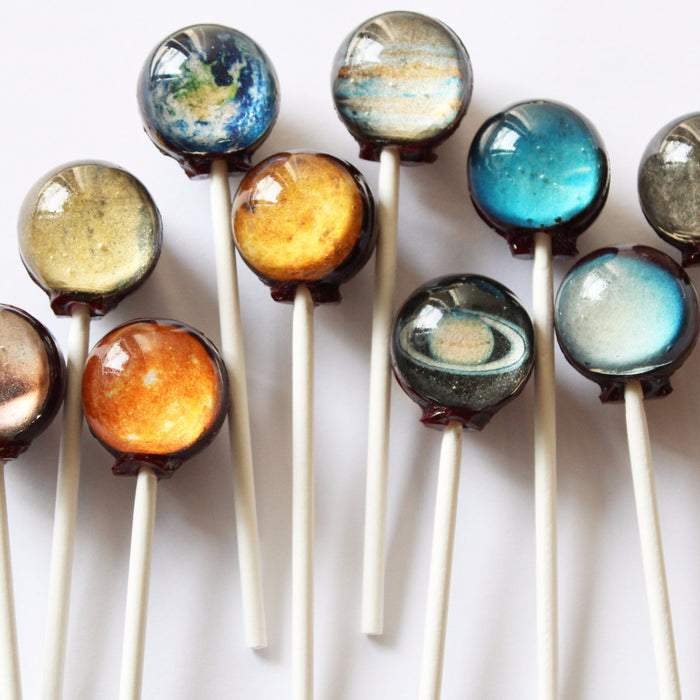 images of planets encapsulated in a lollipop