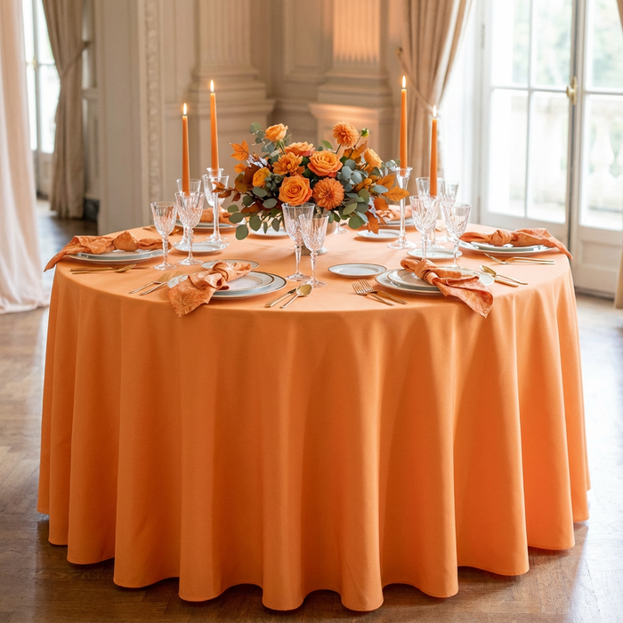 Premium Polyester 120" Round Tablecloth - Orange | charger plate | napkin | dinner plate | wine goblets |