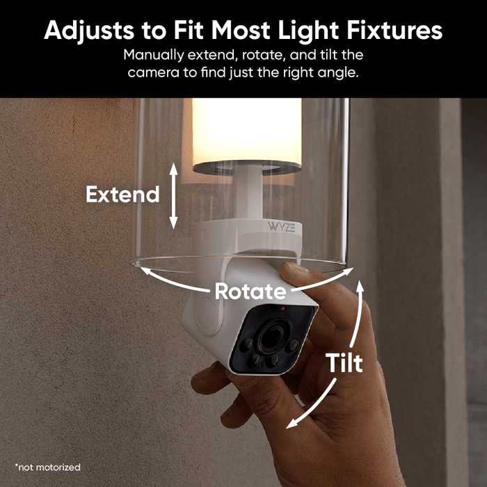 A person is holding a Wyze Bulb Cam, which is a 2-in-1 outdoor security camera and smart LED light bulb.