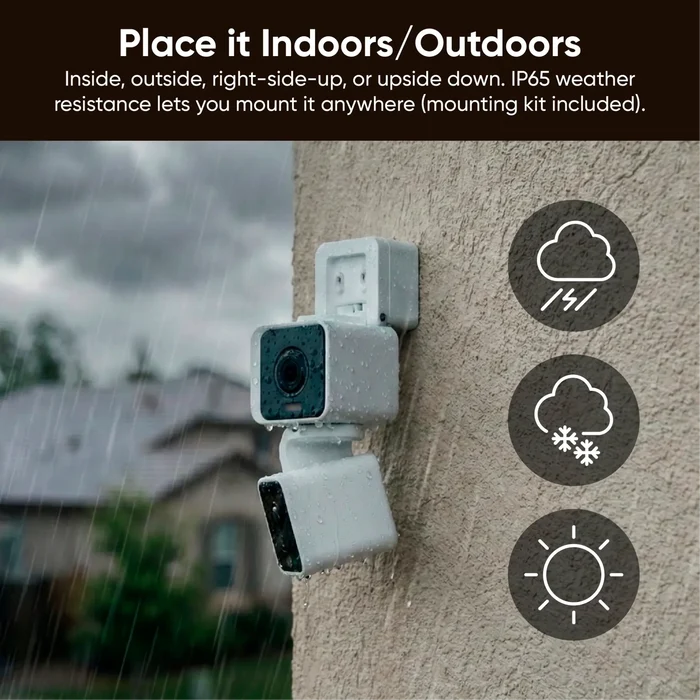 A Wyze refurbished product, the Wyze Duo Cam Pan, is shown in a rain-soaked outdoor setting.