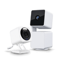A white security camera with a blue lens.