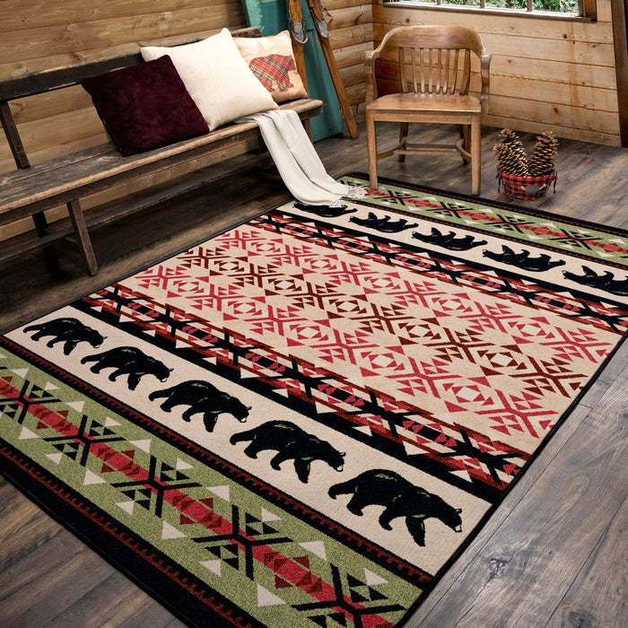 Decorative rug with bear design on a wooden floor in a cabin setting - Your Western Decor