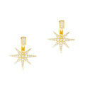 Gold starburst earring jackets with baguette crystal detailing on white background