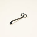 Matte black wick trimmers for candles.