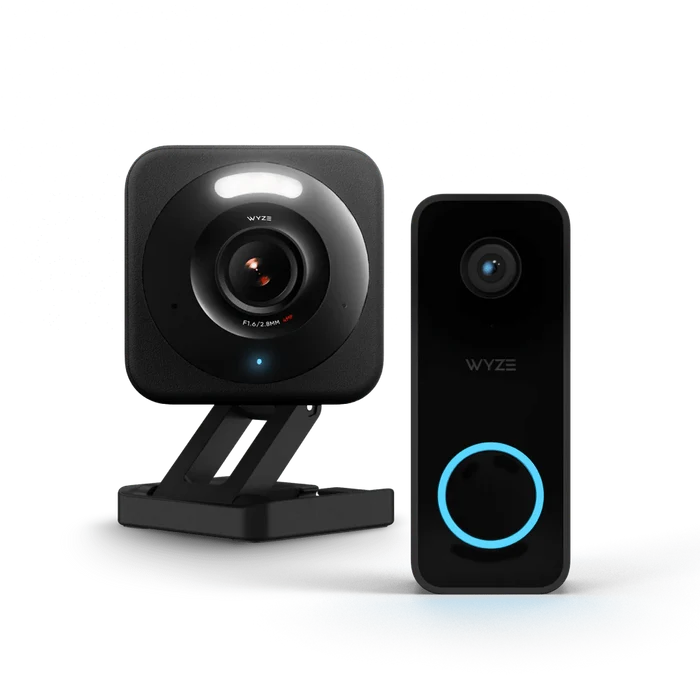 A black camera with a blue circle on it.