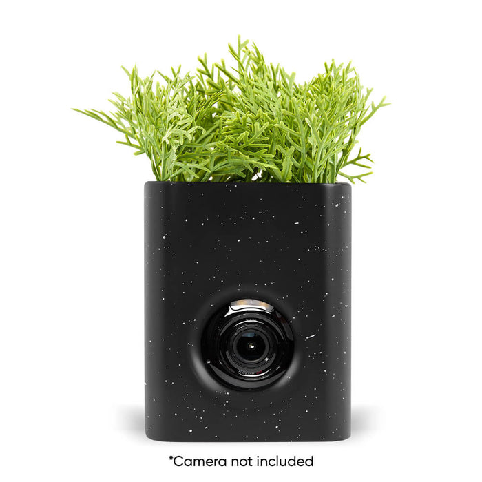 A black vase with a camera not included.