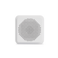 Wyze Chime - A white round speaker with a hole in the middle.