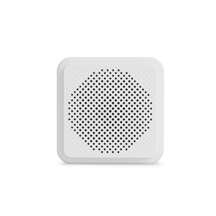 Wyze Chime - A white round speaker with a hole in the middle.
