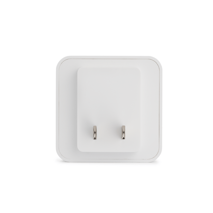 A white chime box with a silver plug.
