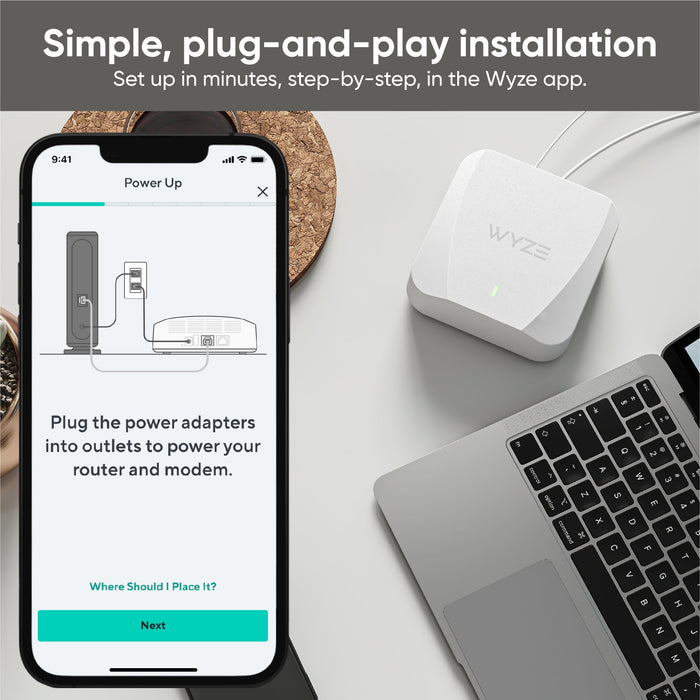 Wyze Wi-Fi 6 Mesh Router displayed on a table.