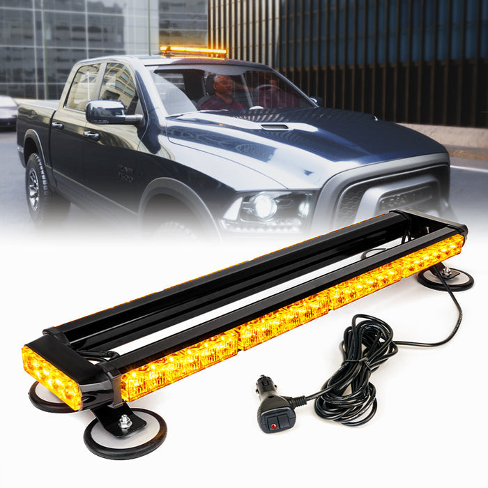 A mini emergency light bar with a magnetic base mounted on the roof of a vehicle, displaying various amber-colored LED lights.
